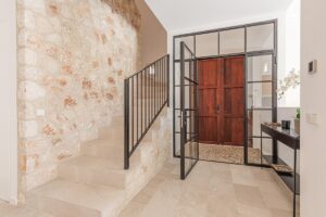 Harmonious interiors with soft tones and natural textures in Ses Salines homes